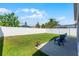 Spacious backyard features well maintained lawn at 13416 Greenpointe Dr, Orlando, FL 32824