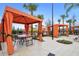 Community cabanas with tables and chairs near the playground at 1415 Oak Marsh St, Davenport, FL 33837