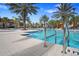Beautiful community pool area with inviting water features and a nearby seating and recreation building at 1415 Oak Marsh St, Davenport, FL 33837