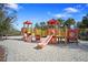 Colorful community playground area with slides and climbing structures for  at 1415 Oak Marsh St, Davenport, FL 33837