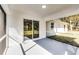 Covered patio providing an open-air space for relaxation with a view of the backyard at 1475 James St, New Smyrna Beach, FL 32168