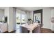 Open-concept dining area featuring table, chairs, and view of living space at 1521 Redwood Ln, Lake Hamilton, FL 33851