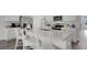 Spacious kitchen featuring a central island, stainless steel appliances, and ample counter space at 1521 Redwood Ln, Lake Hamilton, FL 33851
