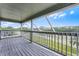 Enjoy the scenic views from this screened-in balcony with views of trees and a beautiful lawn at 219 Strathmore Cir, Kissimmee, FL 34744