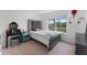Cozy bedroom with stylish decor, a comfortable bed, and a bright window offering natural light at 219 Strathmore Cir, Kissimmee, FL 34744