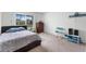 Inviting bedroom with a comfortable bed, ample natural light, and serene ambiance for restful nights at 219 Strathmore Cir, Kissimmee, FL 34744