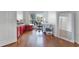 Hardwood floors, a large desk, and ample storage space, perfect for working from home at 219 Strathmore Cir, Kissimmee, FL 34744