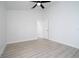 Bedroom features a doorway, closet, and light hardwood flooring at 2218 Newt St, Orlando, FL 32837