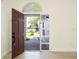 Open entryway featuring a view of the living space and bright natural light at 2218 Newt St, Orlando, FL 32837