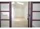 Bright living room featuring vaulted ceilings, skylights, and an open floor plan with light wood floors at 2218 Newt St, Orlando, FL 32837