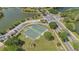 Aerial view of a well-maintained community basketball court, perfect for sports and recreation at 2315 Anhinga Dr, Kissimmee, FL 34743