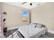 Bedroom with views of the outside features luxury vinyl floors and one window at 2315 Anhinga Dr, Kissimmee, FL 34743