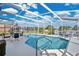 Enclosed pool area with a beautiful pool and a scenic water view at 2315 Anhinga Dr, Kissimmee, FL 34743