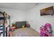 Playful bedroom featuring a TV, bunk beds, and carpeted floors at 236 Elm Ct, Kissimmee, FL 34759