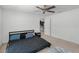 Bright primary bedroom with a ceiling fan, and a walk-in closet at 236 Elm Ct, Kissimmee, FL 34759