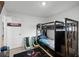 bedroom featuring bunk beds, gaming chairs, ceiling fan, and carpet at 236 Elm Ct, Kissimmee, FL 34759
