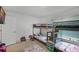 bedroom with bunk beds, toys, and a bright, playful atmosphere at 236 Elm Ct, Kissimmee, FL 34759