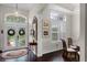 Elegant foyer featuring hardwood floors and access to the dining room at 243 Sagecrest Dr, Ocoee, FL 34761
