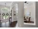 Stunning foyer with hardwood floors and view of the dining room at 243 Sagecrest Dr, Ocoee, FL 34761