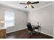 A well-lit office space featuring a desk, chair, and ample natural light at 243 Sagecrest Dr, Ocoee, FL 34761