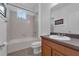 Clean bathroom featuring a shower-tub, vanity, and framed art at 248 Wallrock Ct, Ocoee, FL 34761