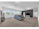 Large bonus room with plush carpeting and lots of natural light, perfect for entertaining at 248 Wallrock Ct, Ocoee, FL 34761