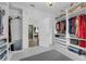 Bright walk-in closet with lots of storage space and access to primary bath at 248 Wallrock Ct, Ocoee, FL 34761