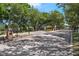 Community gated entrance with brick pillars and a guard station on a sunny day at 248 Wallrock Ct, Ocoee, FL 34761