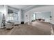 Spacious living room with ample natural light and a seamless flow to the dining area at 248 Wallrock Ct, Ocoee, FL 34761