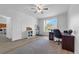 Bright office with a large window, desk and wood-look vinyl plank flooring at 248 Wallrock Ct, Ocoee, FL 34761