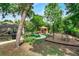View of community playground with slide, landscaping, gazebo, and covered seating area at 248 Wallrock Ct, Ocoee, FL 34761