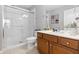 Modern bathroom with glass shower, vanity, and toilet, exuding a clean and refreshing ambiance at 2509 Archfeld Blvd, Kissimmee, FL 34746