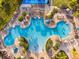 Aerial view of a large community pool with plenty of space for swimming and lounging in the sun at 2509 Archfeld Blvd, Kissimmee, FL 34746