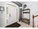 Inviting foyer with arched ceiling, coat rack and decor at 2509 Archfeld Blvd, Kissimmee, FL 34746