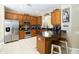 Modern kitchen with stainless steel appliances, breakfast bar, and beautiful countertops at 2509 Archfeld Blvd, Kissimmee, FL 34746