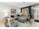 Bright living room with coordinated decor, dining area, and lots of natural light at 2509 Archfeld Blvd, Kissimmee, FL 34746