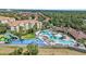 Aerial view of community waterpark featuring resort-style pools and amenities at 2509 Archfeld Blvd, Kissimmee, FL 34746