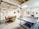 Entertaining garage space with games, ping pong table, and flexible recreational space at 254 Andalusia Loop, Davenport, FL 33837