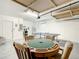 Multi-purpose garage with a game table, ping pong, arcade games, and custom storage at 254 Andalusia Loop, Davenport, FL 33837