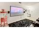 Delightful entertainment room with a projector screen and nostalgic popcorn machine at 254 Andalusia Loop, Davenport, FL 33837