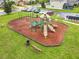 Community playground with slides, swings, and climbing structures for Gathering enjoyment at 254 Andalusia Loop, Davenport, FL 33837