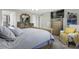 Inviting main bedroom with a comfortable bed, decorative furnishings, and ample closet space at 2613 Camden Park Loop, Davenport, FL 33837