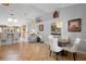 Cozy living space with view of dining area and adjacent rooms at 26901 Racquet Cir, Leesburg, FL 34748