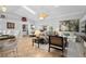 Open floor plan, with a cozy living room space and dining area at 26901 Racquet Cir, Leesburg, FL 34748