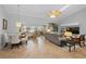 Inviting living room area showcasing comfortable seating and natural light at 26901 Racquet Cir, Leesburg, FL 34748
