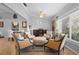 Comfortable seating arrangement creating a welcoming living room ambiance at 26901 Racquet Cir, Leesburg, FL 34748