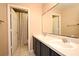 Bathroom features double sinks and a shower and tub combo, plus linen closet at 297 Sky Valley St, Clermont, FL 34711