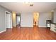 Spacious living room featuring beautiful laminate wood floors and neutral paint, creating a serene atmosphere at 297 Sky Valley St, Clermont, FL 34711