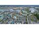 A picturesque aerial view of a resort community showcasing colorful homes, pools, and water attractions at 3083 Key Lime Loop, Kissimmee, FL 34747