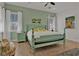 Bright bedroom with a unique bed frame and coastal-themed decor at 3083 Key Lime Loop, Kissimmee, FL 34747
